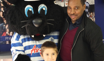 Ex QPR player Andrew Impey with mascot Jude and a young event attendee